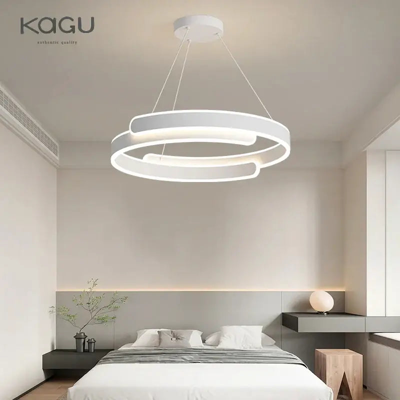 Modern black white led ring chandelier pendant light with sleek overlapping circular rings for living room decorbites black white
