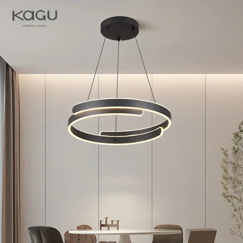 Modern black kagu pendant light with sleek overlapping circular rings and illuminated edges for decorbites black white led chandelier