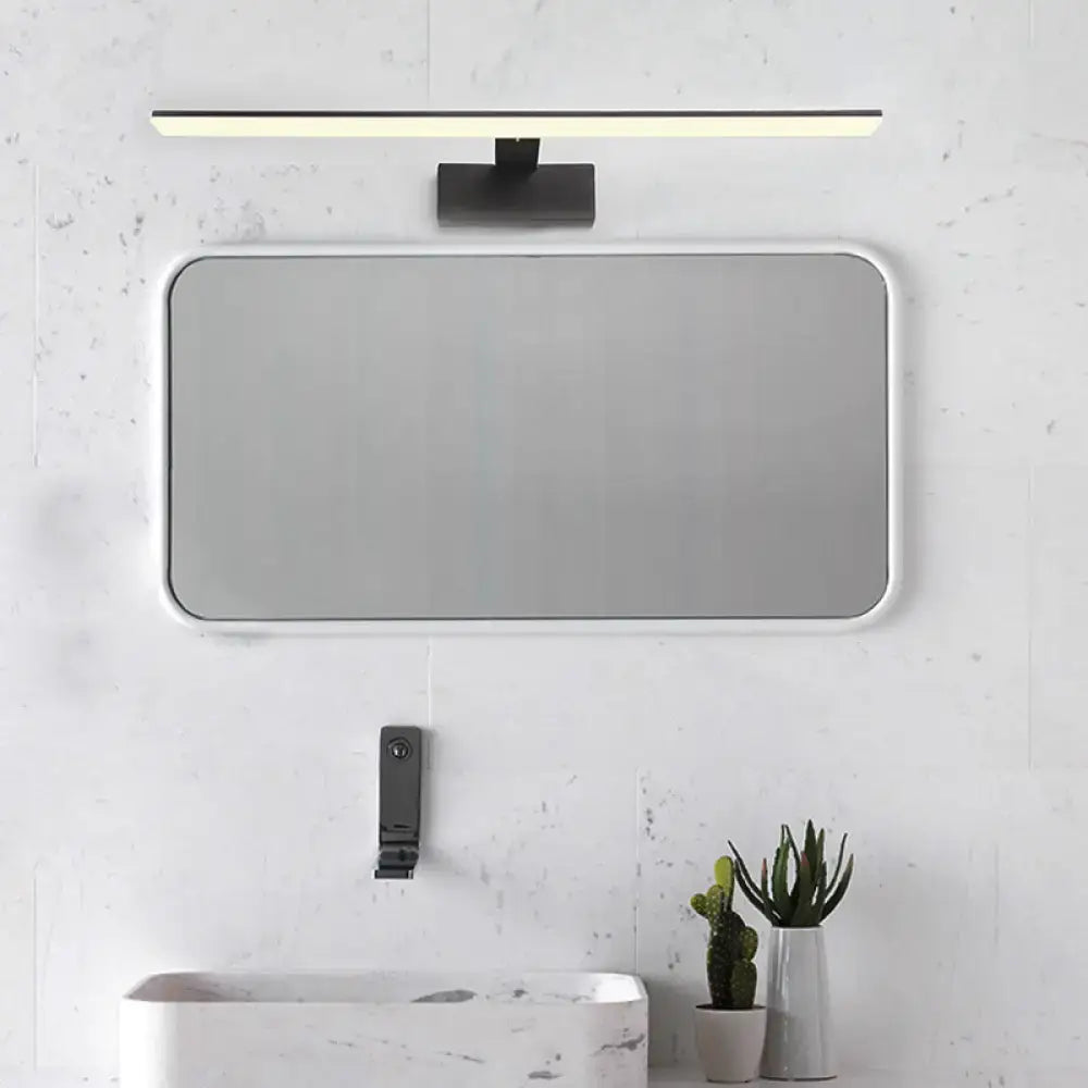 Modern black white led vanity lamp with sleek white framed rectangular mirror above minimalist bathroom sink