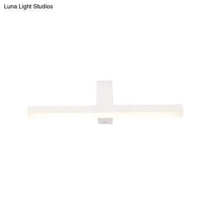 Modern black white led vanity light featuring a sleek minimalist cross design for modern led bathroom use