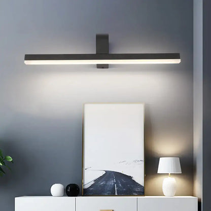 Modern black and white led vanity light featuring a matte black rectangular wall-mounted bathroom sconce design