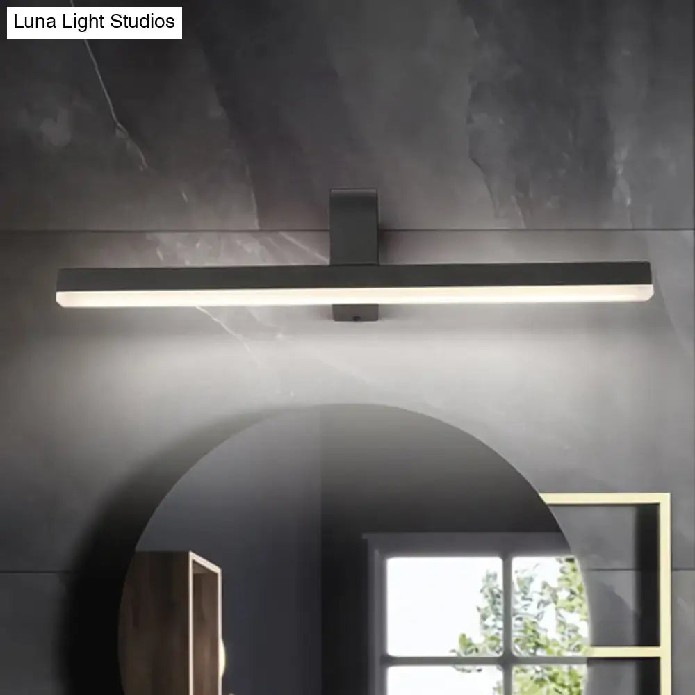 Modern black and white led vanity light with warm color temperature and maximum bulb wattage mounted above arched mirror