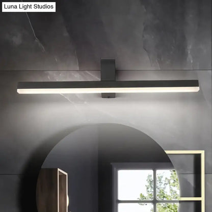 Modern black and white led vanity light with warm color temperature and maximum bulb wattage mounted above arched mirror
