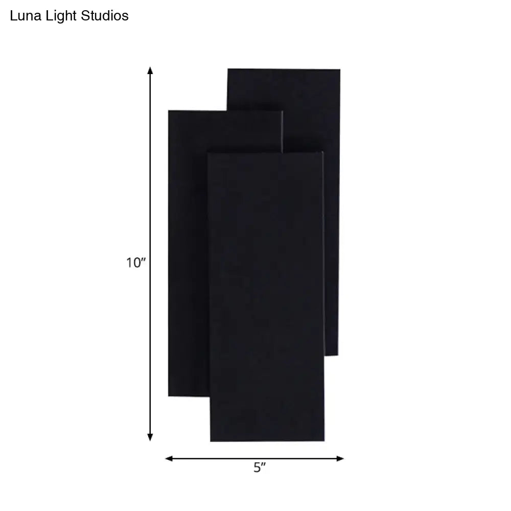 Modern black and white wall lamp with layered rectangular panels and 5in fixture height for bedroom use