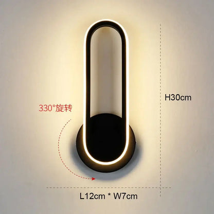 Modern black and white led wall light with sleek minimalist oval design for bedroom geometric wall light use