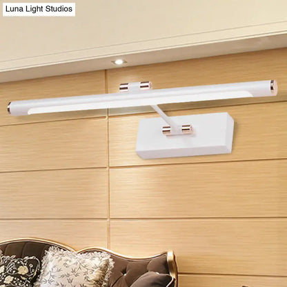 Modern black and white wall sconce with metallic accents 18 inch fixture for sleek bathroom lighting