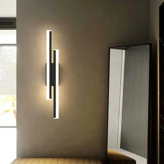 Modern black and white led wall sconce lamp with sleek vertical rectangular design for bedroom lighting