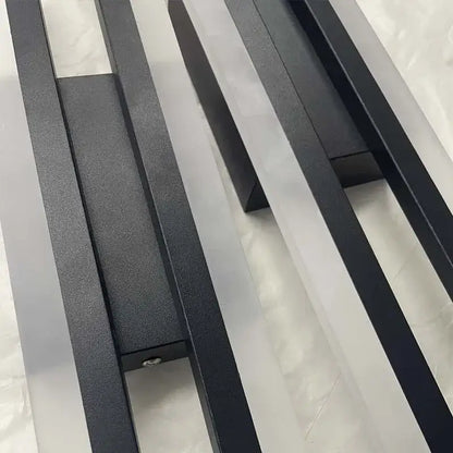 Modern black and white led wall sconce lamp with black matte metal slatted radiator design for bedroom lighting
