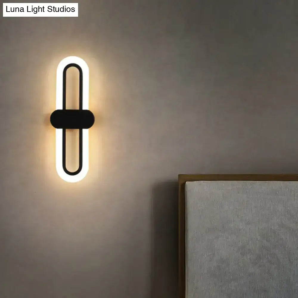 Modern black and white led wall sconce with sleek minimalist design and 110v-120v light type for living room use