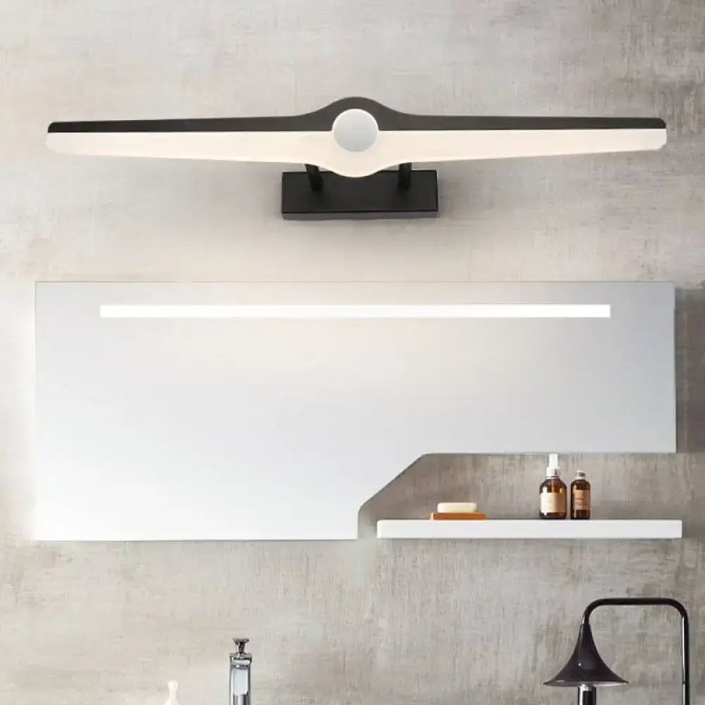 Modern black and white led wall sconce with a sleek elongated design and integrated circular accent for minimalist living room lighting