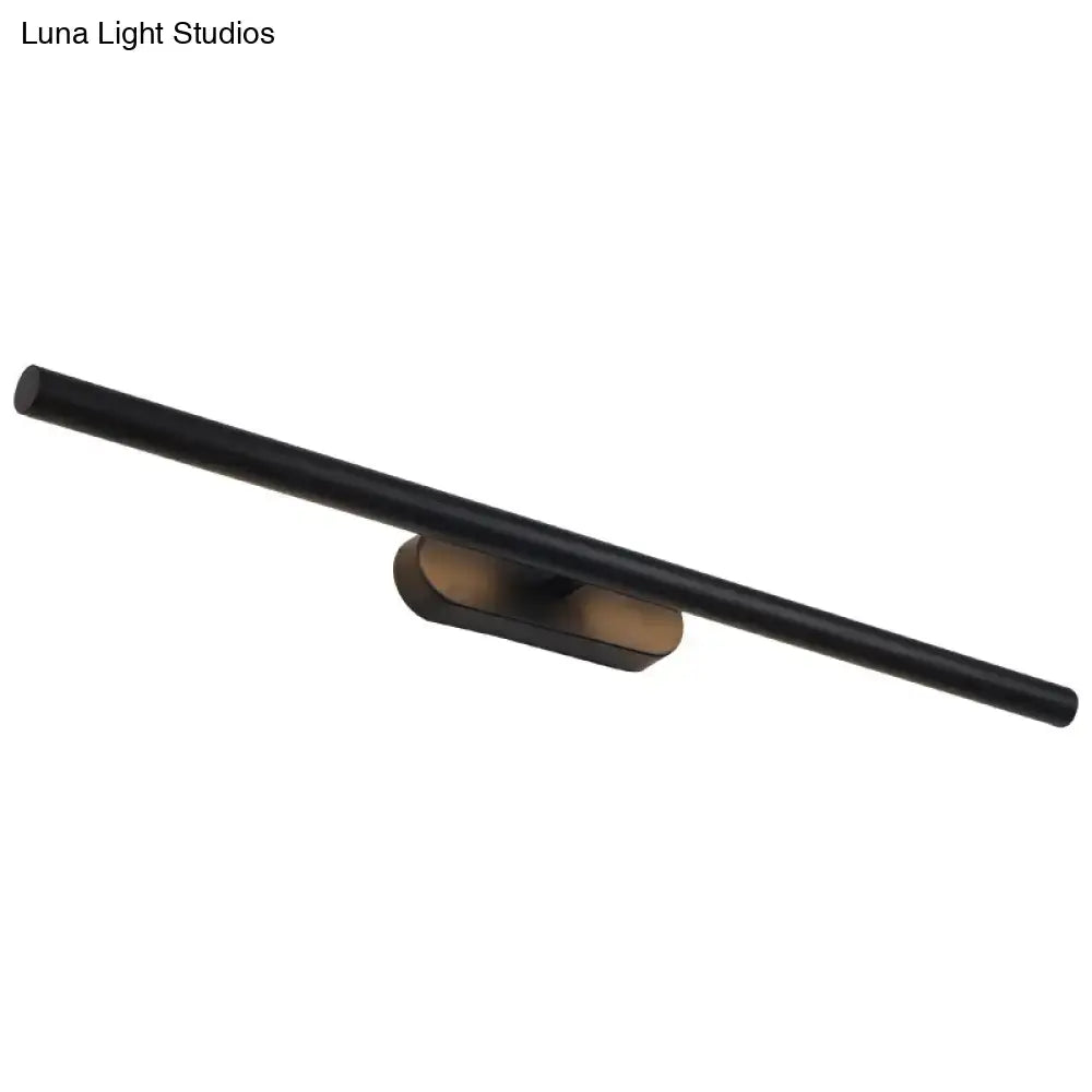 Modern black and white led wall vanity light with black matte cylindrical shade and bronze-toned bracket for bathroom use