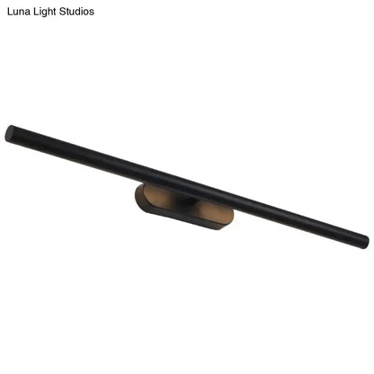 Modern black and white led wall vanity light with black matte cylindrical shade and bronze-toned bracket for bathroom use