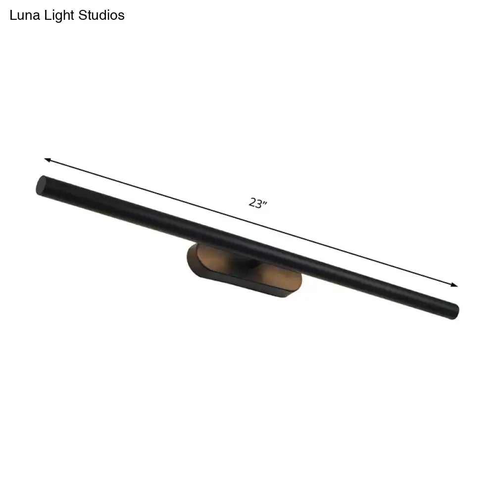 Modern black and white led wall vanity light with black matte linear sconce and bronze-toned mounting base for bathroom