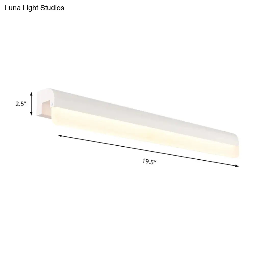 Modern black and white linear led wall light with sleek rectangular design and warm glow for bathroom sconce