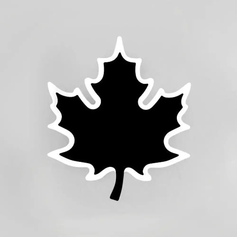 Black maple leaf sticker with a crisp white outline for modern black and white maple leaf sconce light bedroom decor