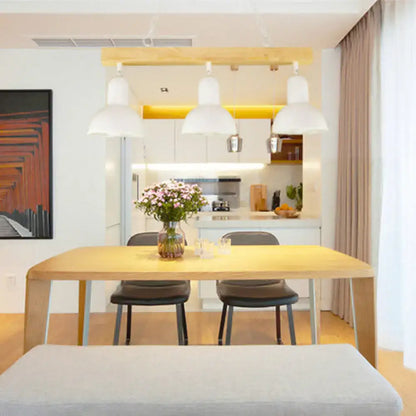 Decorbites™ modern dome island lighting with black white metal pendant lights above a light wood dining table with pink flowers