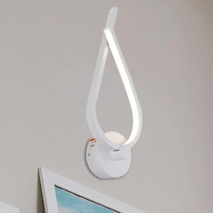 Modern black and white metal kink linear wall light with sleek teardrop shaped white led wall sconce design