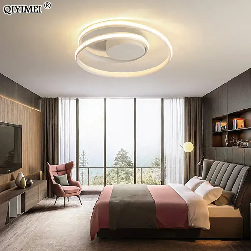 Modern black and white minimalist ceiling light featuring a white circular led ceiling light with concentric ring design