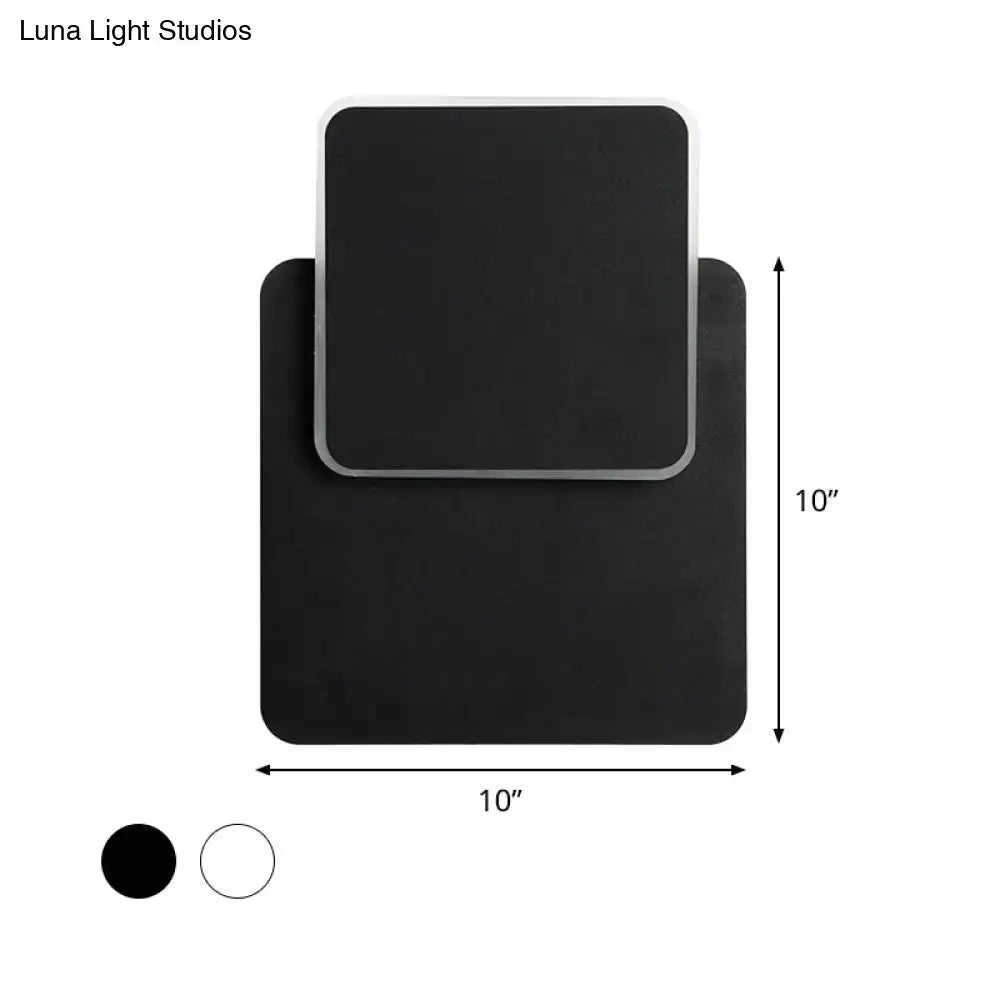 Modern black rectangular wall lamp with silver trim featuring sleek minimalist design and led light for bedroom use