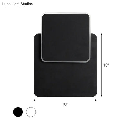 Modern black rectangular wall lamp with silver trim featuring sleek minimalist design and led light for bedroom use