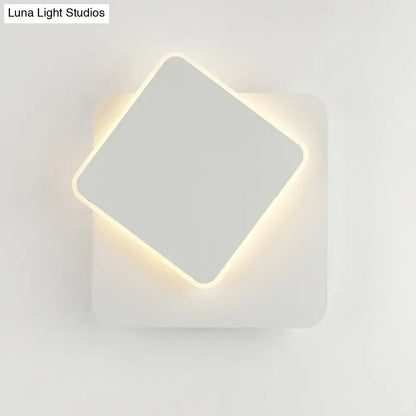 Modern black and white minimalist led wall lamp with a sleek white square design and soft ambient edge lighting