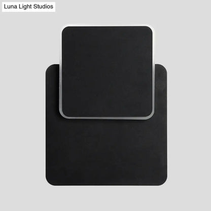 Modern black wall lamp with led light featuring sleek minimalist design and subtle metallic trim for bedroom use