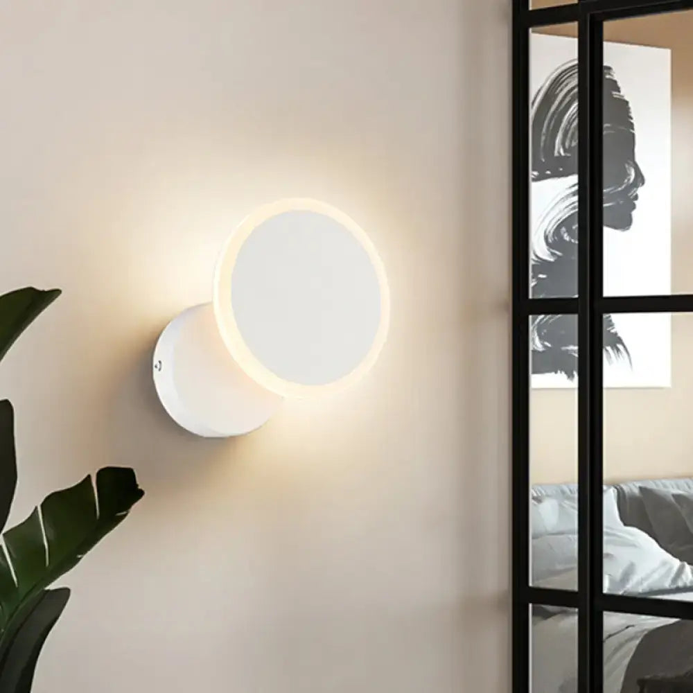 Modern black and white minimalist led wall sconce with glowing warm light ring for living room led wall lighting