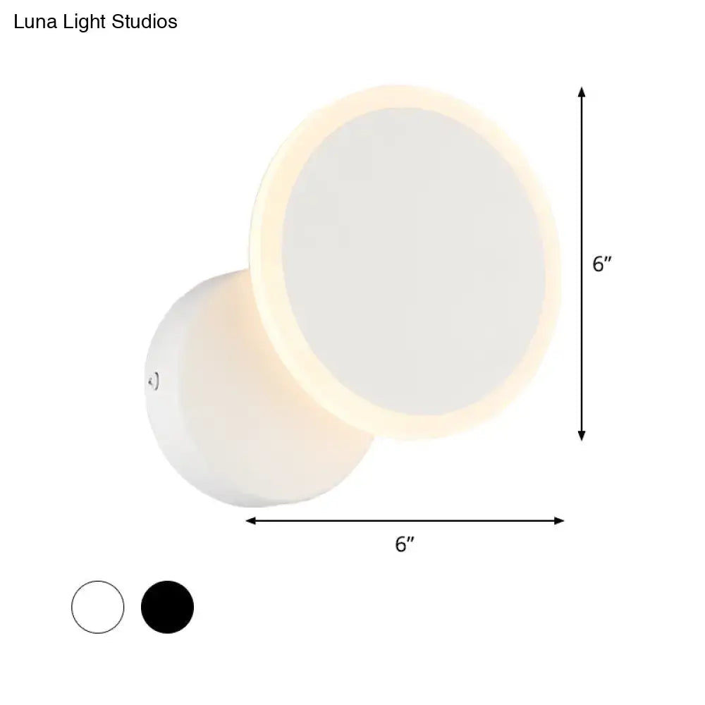 Modern black and white minimalist led wall sconce with glowing white led ring and matte finish for living room lighting