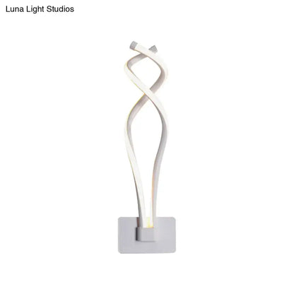 Modern black white wall lamp featuring a twisted white acrylic shade and minimalist gray base with musical note design
