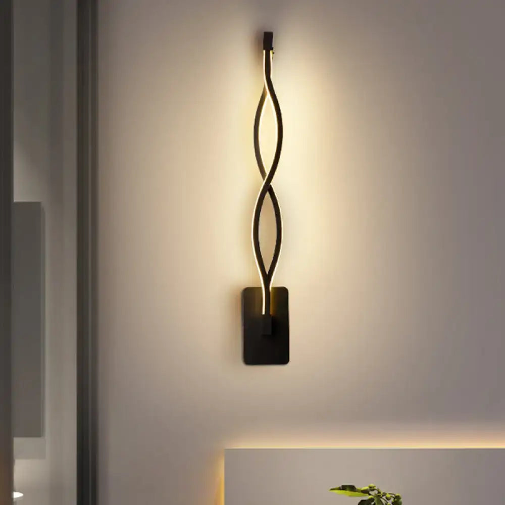 Modern black and white musical note wall lamp with acrylic shade and sleek twisted wall sconce design with warm led lighting