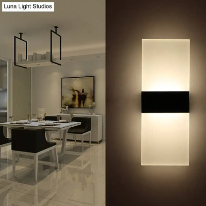 Modern black white rectangular led sconce featuring two illuminated white panels separated by a black strip for living room