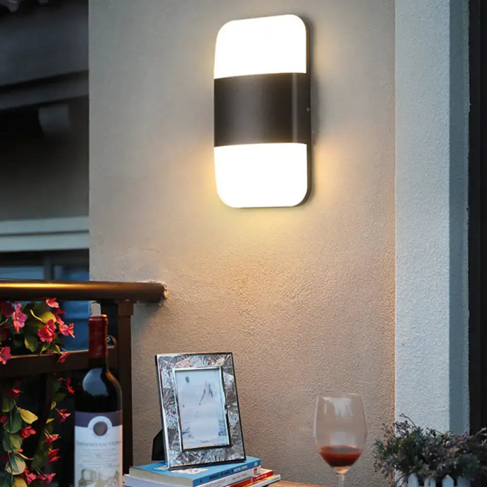 Modern black and white rectangular sconce light emitting warm white ambient light compatible with 220v-240v and 110v-120v