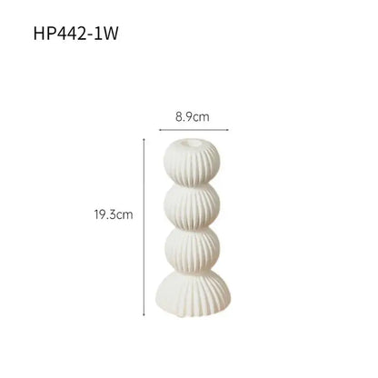Modern black and white ribbed geometric ceramic candle holder with stacked spherical tiers for living room decorbites decor