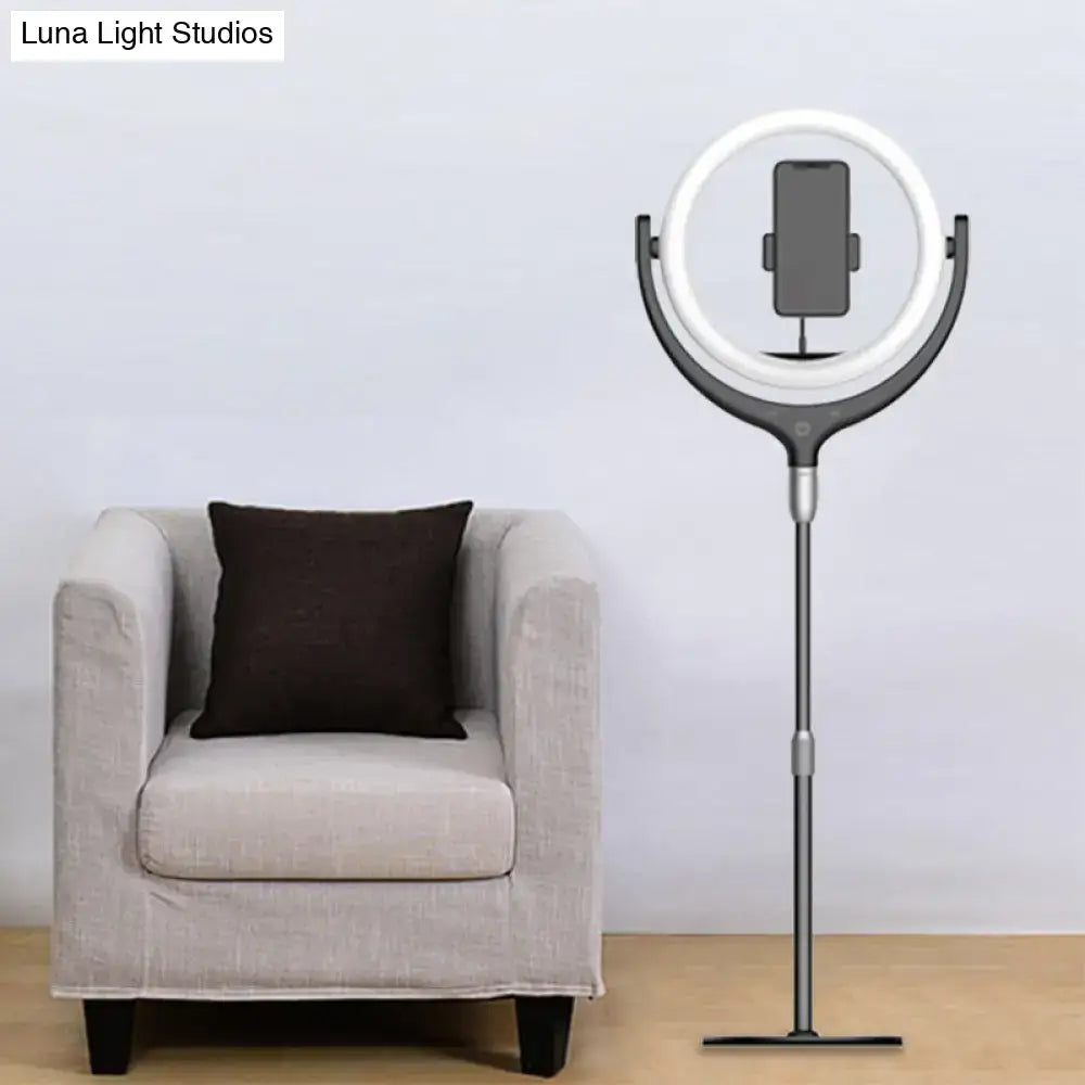 Modern black and white led mirror lamp ring light with phone stand featuring white illuminated circle on black base