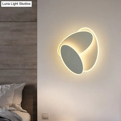 Modern black and white rotatable led wall light fixture with sleek curved design and matte gray finish for bedroom mirror