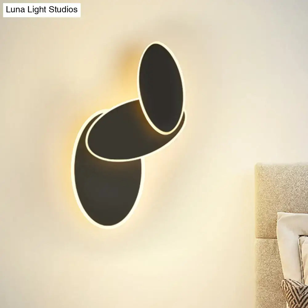 Modern black oval-shaped rotatable led wall light fixture with glowing white edge for bedroom mirror use