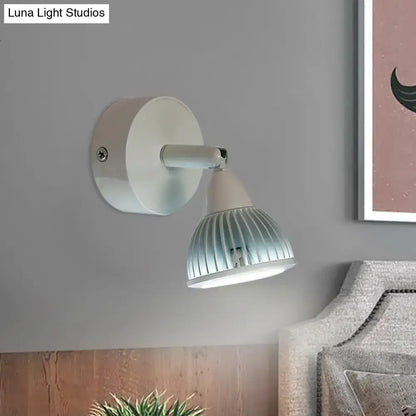 White wall-mounted spotlight with ribbed translucent glass shade in modern black white rotatable wall light for bedroom use