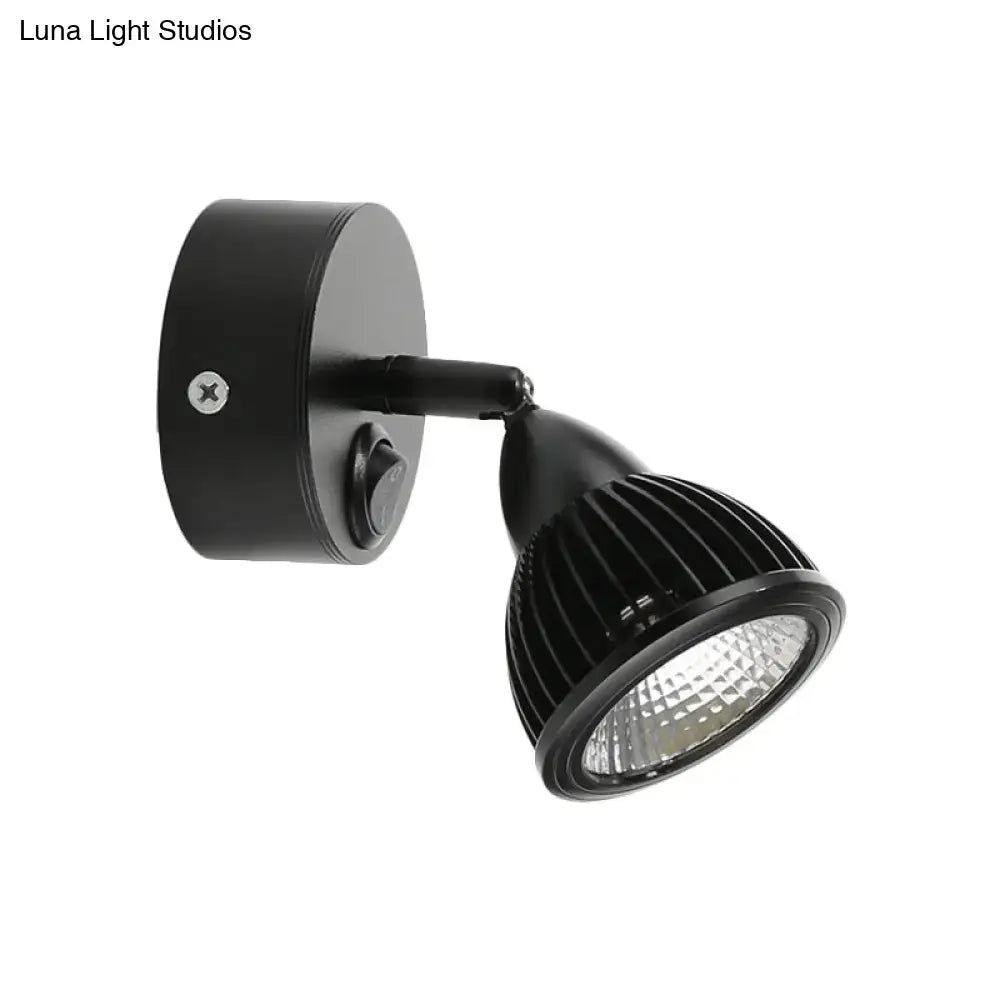Modern black and white rotatable wall light with black matte adjustable spotlight and ribbed lens for bedroom LED lighting
