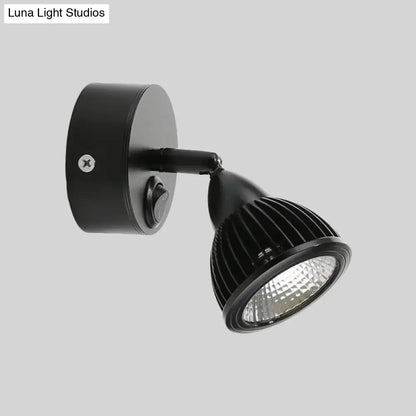 Modern black and white rotatable wall light with black led spotlight and ribbed heat-dissipating housing for bedroom use