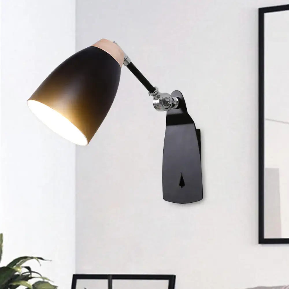 Modern black and white rotatable wall mounted light featuring a black matte wall lamp with copper accent and articulated arm