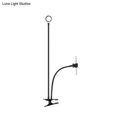 Black adjustable metal round usb mirror lamp with flexible arm and clip base for bedroom use