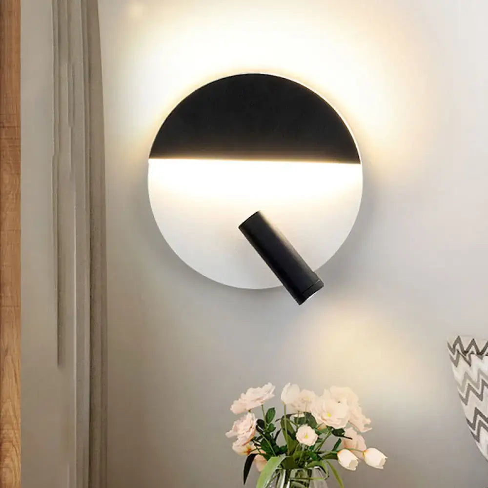 Modern black and white round wall lamp featuring a sleek minimalist design ideal as a bedroom led wall light