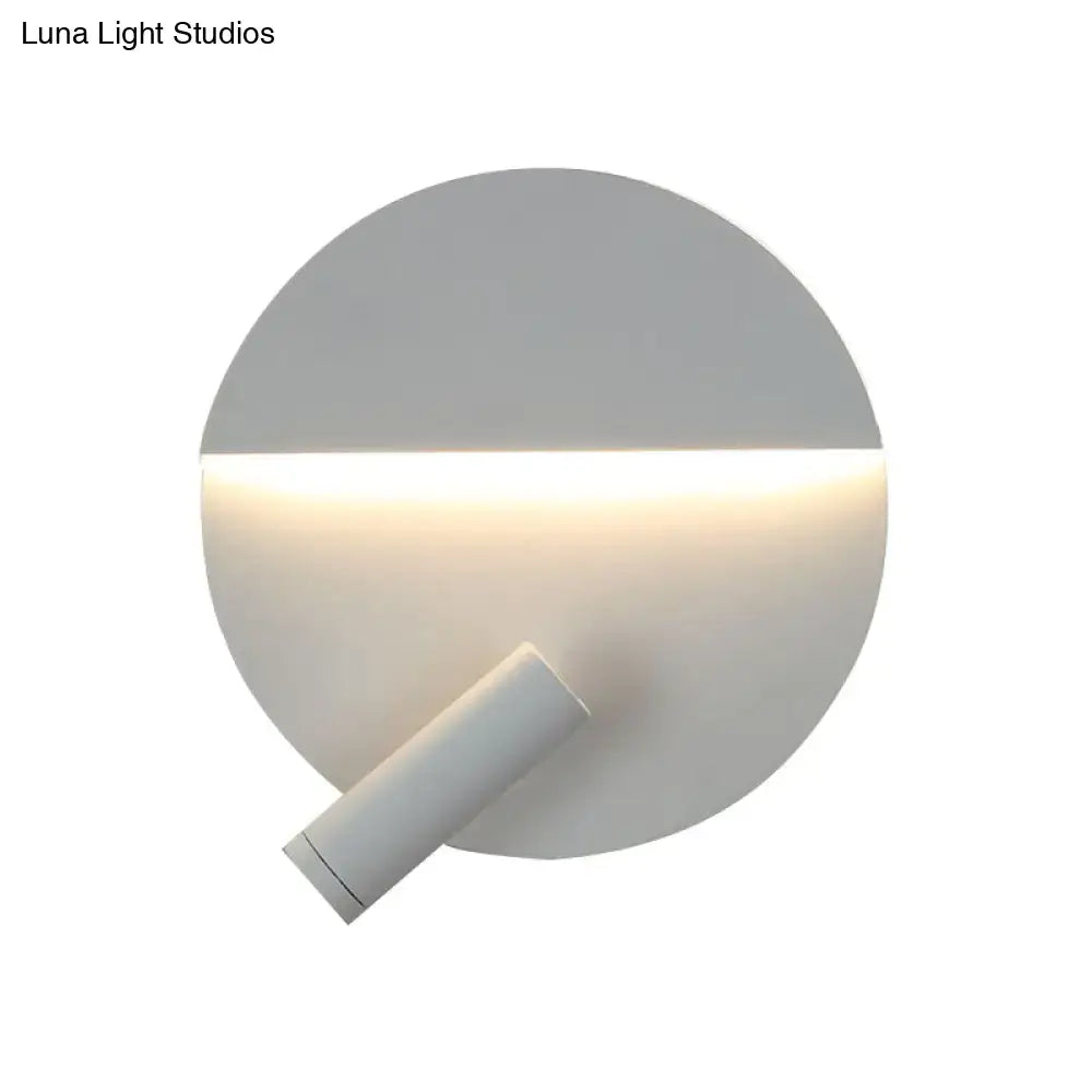 Modern black and white round wall lamp with a sleek minimalist design and adjustable cylindrical wall light fixture