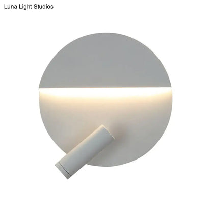 Modern black and white round wall lamp with a sleek minimalist design and adjustable cylindrical wall light fixture