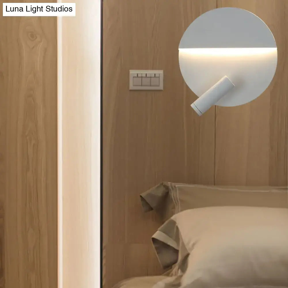 Modern black and white round wall lamp with sleek minimalist wall light and adjustable arm for bedroom use