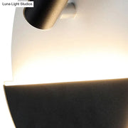 Modern black and white round wall lamp with a sleek curved design wall light for bedroom led spotlight installation