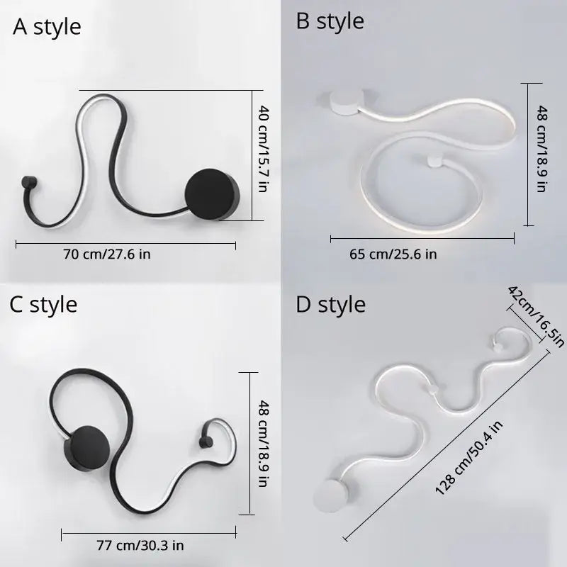 Modern black and white sculptural wall lamps paired with sleek black and transparent acrylic coat hooks for contemporary acrylic wall decorbites