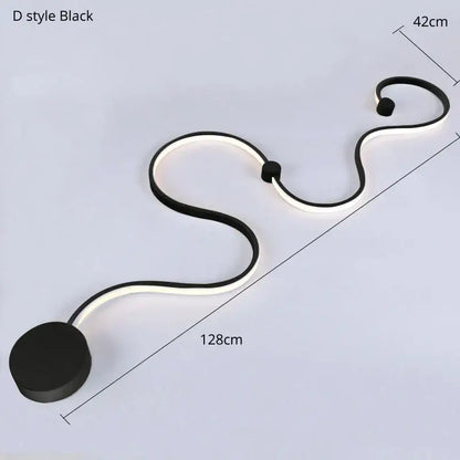 Modern black and white sculptural wall lamps featuring a black d-style led light with a contemporary acrylic curved design for decorbites bedroom decor