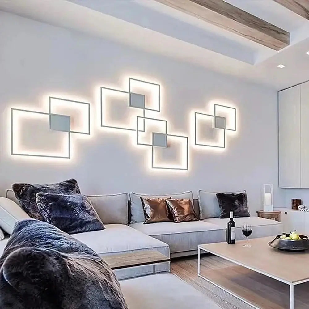 Modern black and white square led wall sconce with illuminated geometric frames and metallic accents for bedroom lighting