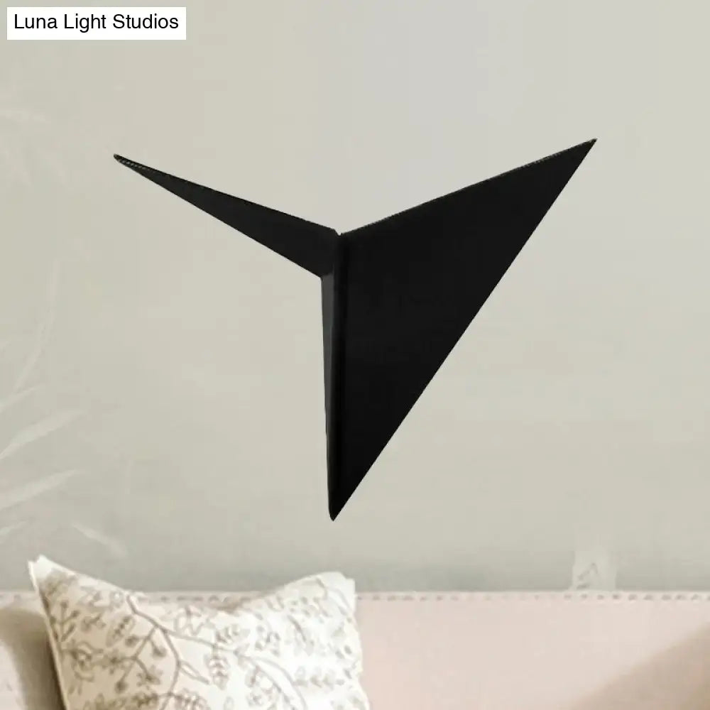 Modern black triangle sheet wall lamp with sleek design perfect as a bedroom sconce light fixture